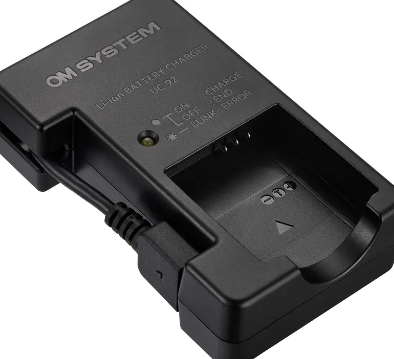 OM SYSTEM CHARGEUR BATTERIE UC 92< Energie
